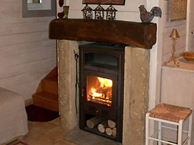 Fireplace in the living room<br>Ground floor